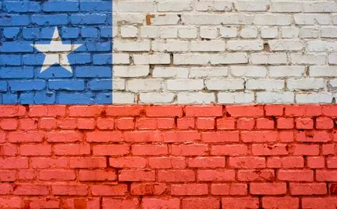 Flag of Chile painted on brick wall, background texture Stock Photos