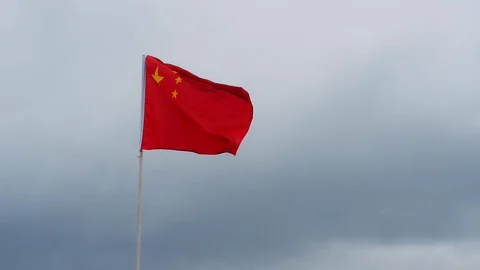 Flag China, which flutters in the wind against a cloudy sky, the flag is Stock Footage 119986282