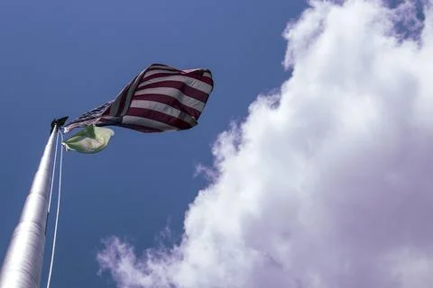 Flag in the clouds Stock Photos