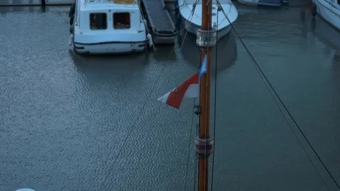 Flag Of Cologne Blowing In The Wind With River Rhein In The Background Stock Footage 96240098