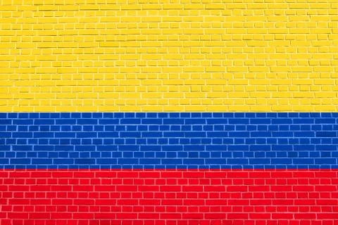 Flag of Colombia on brick wall texture background. Colombian national flag. 스톡 일러스트