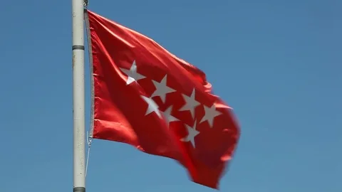 Flag of the Community of Madrid, Spain Stockbeeldmateriaal 76614909