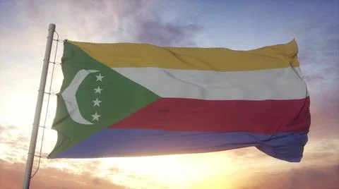 Flag of Comoros waving in the wind, sky and sun background. 3d rendering Stock Illustration