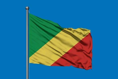 Flag of Congo waving in the wind against deep blue sky. Congolese flag. Foto stock