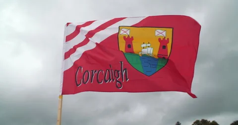 Flag of Cork Ireland blowing in wind Irish Gaelic language Corcaigh Stock Footage 279996859
