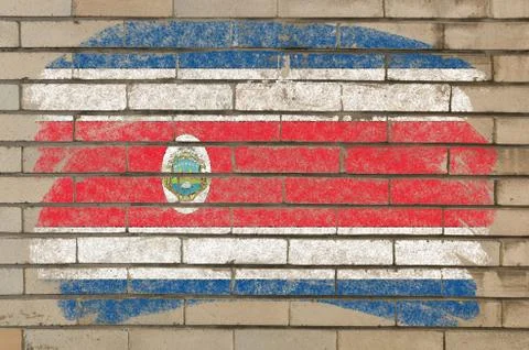 Flag of costarica on grunge brick wall painted with chalk Stock Photos