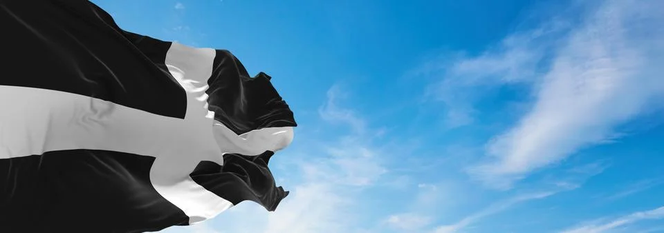 Flag of county Cornwall, UK at cloudy sky background on sunset, panoramic vie Stock Illustration