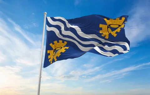 Flag of county Merseyside, UK at cloudy sky background on sunset, panoramic v Stock Illustration