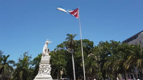 Flag of Cuba is developing in the wind. Cuba flag hanging on the building Stock Footage 108561020