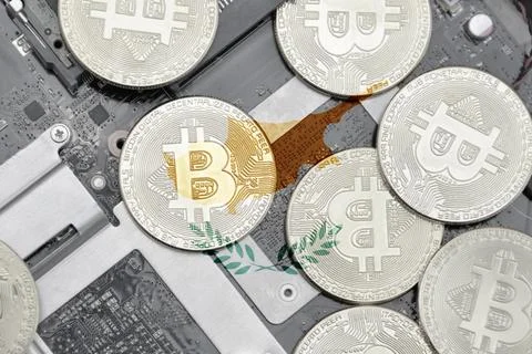 Flag of cyprus on the bitcoins with computer electronic circuit board backgro Stock-Fotos
