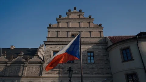 The flag of the Czech Republic waving by wind, there is government building with 스톡 동영상 115235153