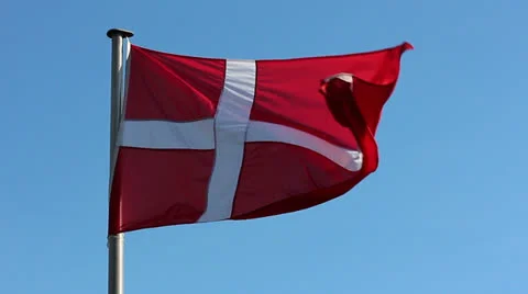 Flag of Denmark against the blue sky Stock Footage 22537895