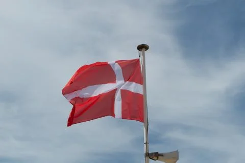 Flag of denmark under blue sky Stock Illustration