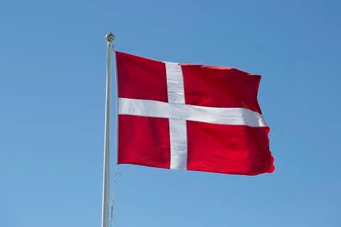 The Flag of Denmark Waving in the Wind Stock Photos