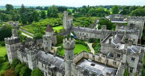 The flag develops on the high tower of the castle in 4k Video stock 267167650