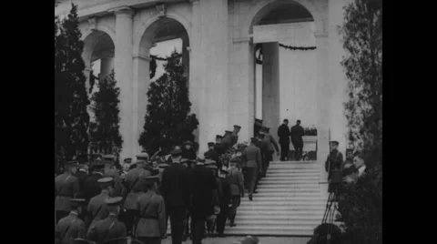 Flag draped coffin being carried up stairs by soldiers Stock Footage