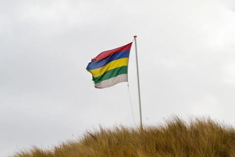 Flag on dune Stock Photos