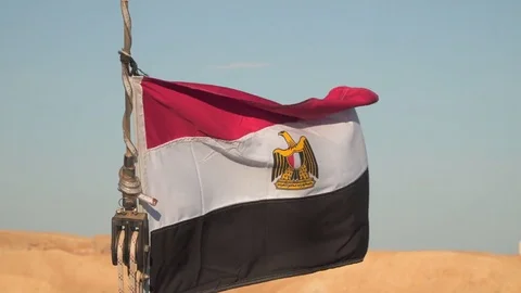 Flag of Egypt on the background of a deserted shore Stock Footage