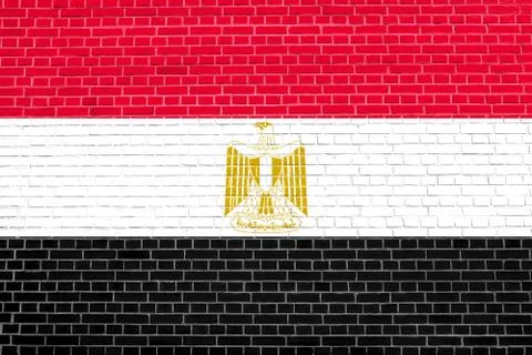 Flag of Egypt on brick wall texture background Stock Photos