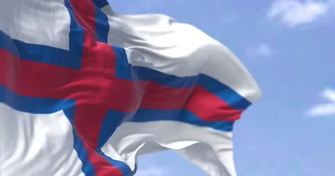 The flag of Faroe Islands waving in the wind on a clear day Stock Footage 195210739