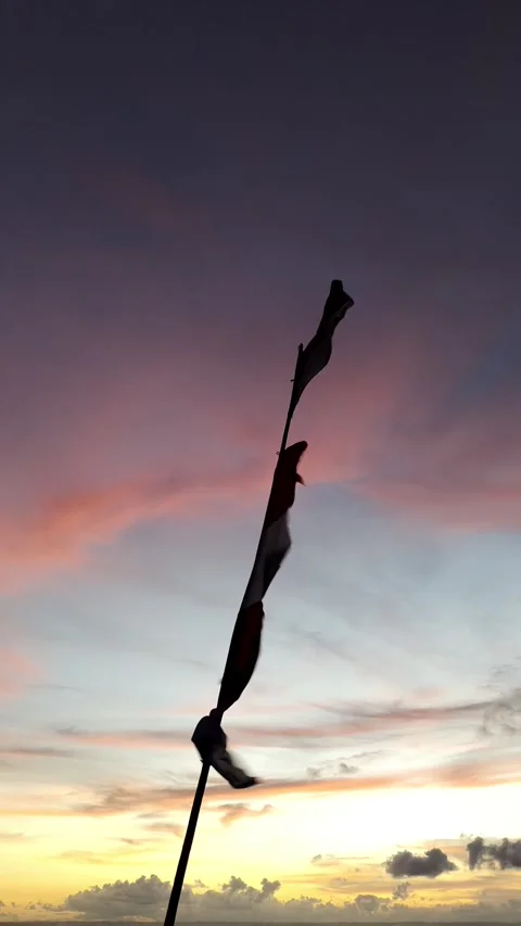 Flag fluttering strong wind sunset sky background Indonesia Flag Stockbeeldmateriaal 274304404