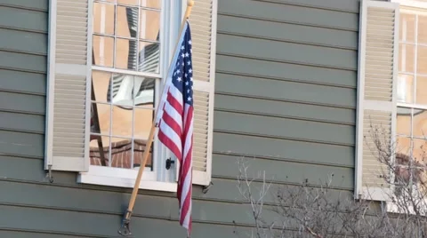 Flag flying outside of old historical building Stock Footage 45533743