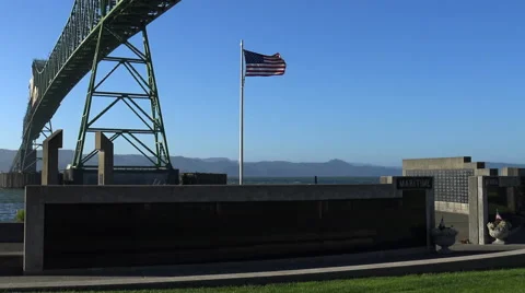 Flag flying over Maritime memorial Video stock 60957644