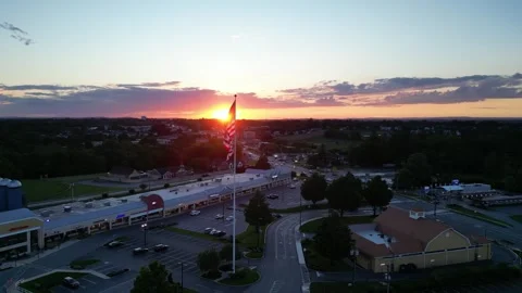 Flag Flying over Tanger Outlets in Lancaster County, PA Stock Footage 291897089