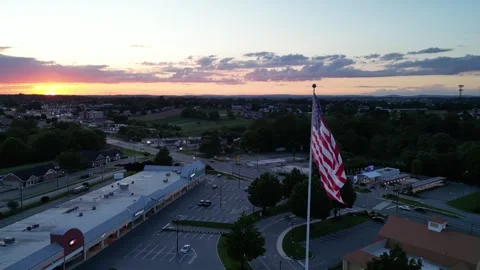 Flag Flying over Tanger Outlets in Lancaster, Pennsylvania Stock Footage 291898837