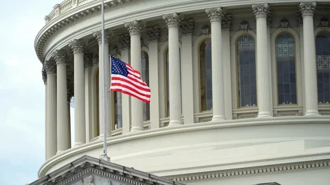 Flag Flying over US Capitol Building Stock Footage 86690517