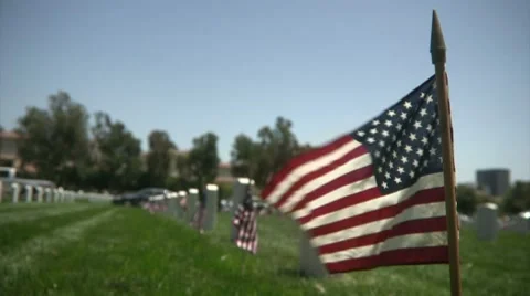 Flag flying at Veteran's Cemetery Video stock 7736892
