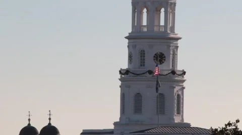 Flag flying in the wind of top of courthouse Stock Footage 45561346