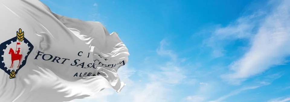 Flag of Fort Saskatchewan , Canada at cloudy sky background on sunset, panora Stock Illustration