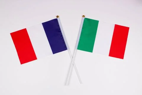 Flag of France and flag of Italy crossed with each other Stock Photos