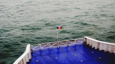 Flag at the front of a ferry blowing in the , time-lapse Stock Footage 112868080