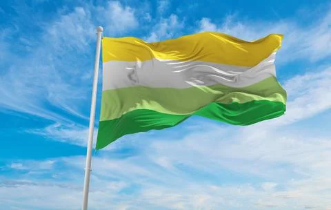 Flag of Gender neutral waving in the wind at cloudy sky. Freedom and love con Stock Illustration