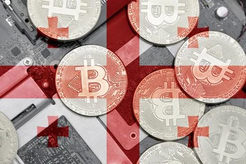 Flag of georgia on the bitcoins with computer electronic circuit board back.. Stock-Fotos