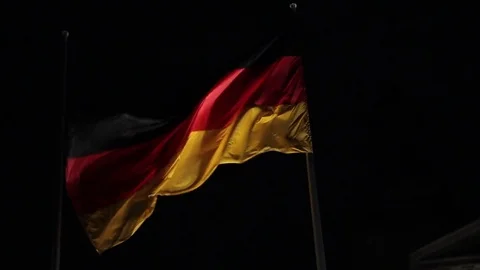 The flag of Germany develops against the background of the night sky, the 库存影片 83537788