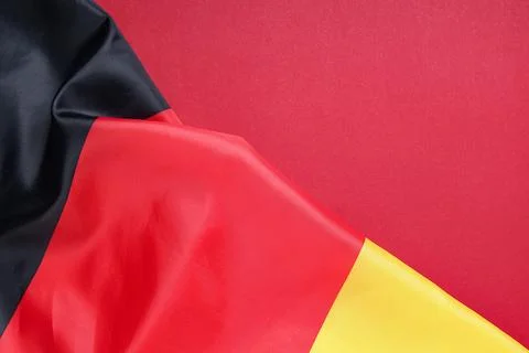 Flag of Germany on red background Stock Photos