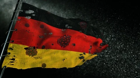 The flag of Germany is torn and marked with the virus of covid-19 . 動画素材 127197752