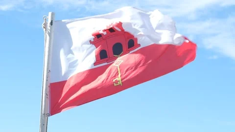 Flag of Gibraltar flying in the wind. Stock Footage 212649052