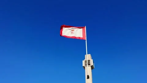 Flag of Gijon developing on the beach, city of Spain. Region Asturias. Stock Footage 296368611