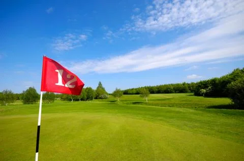 Flag on golf course Stock Photos