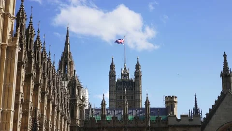 Flag of Great Britain, Palace of Westminster, Houses of Parliament in London.  Stock-Footage 223603685