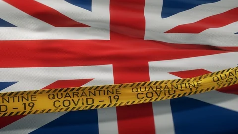 Flag of Great Britain waving on wind with Covid-19 quarantine tape Stock Footage 127722195