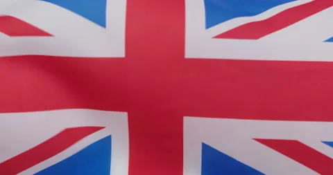 Flag of Great Britain waving in the wind. Close-up Stock Footage 146444321