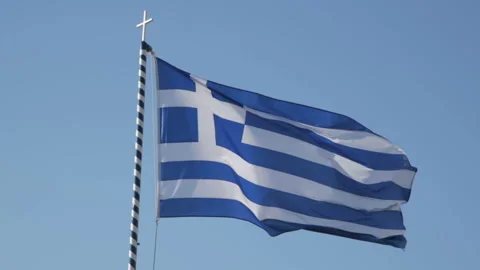 Flag of Greece against the blue sky Stock Footage 304818944