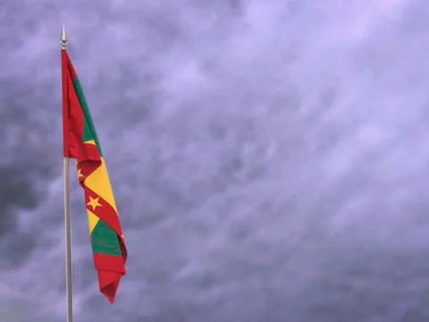 Flag of Grenada hanging down dangling Stock Photos
