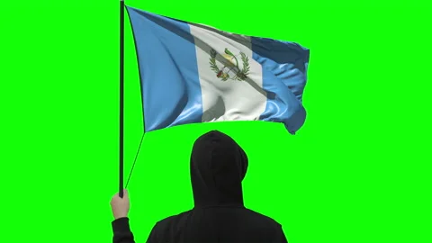 Flag of Guatemala and unknown man, alpha matte Stock Footage 143203440