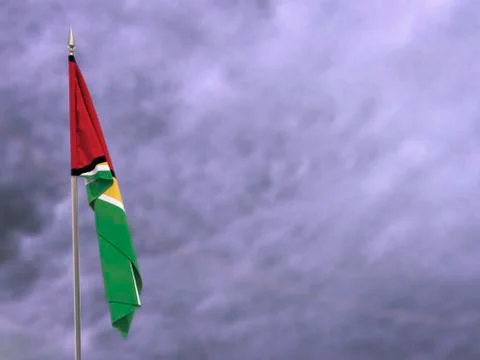 Flag of Guyana hanging down dangling Stock Photos